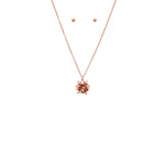 rose gold gift bow necklace with round stud earrings