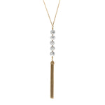 white howlite drop necklace with gold tassels