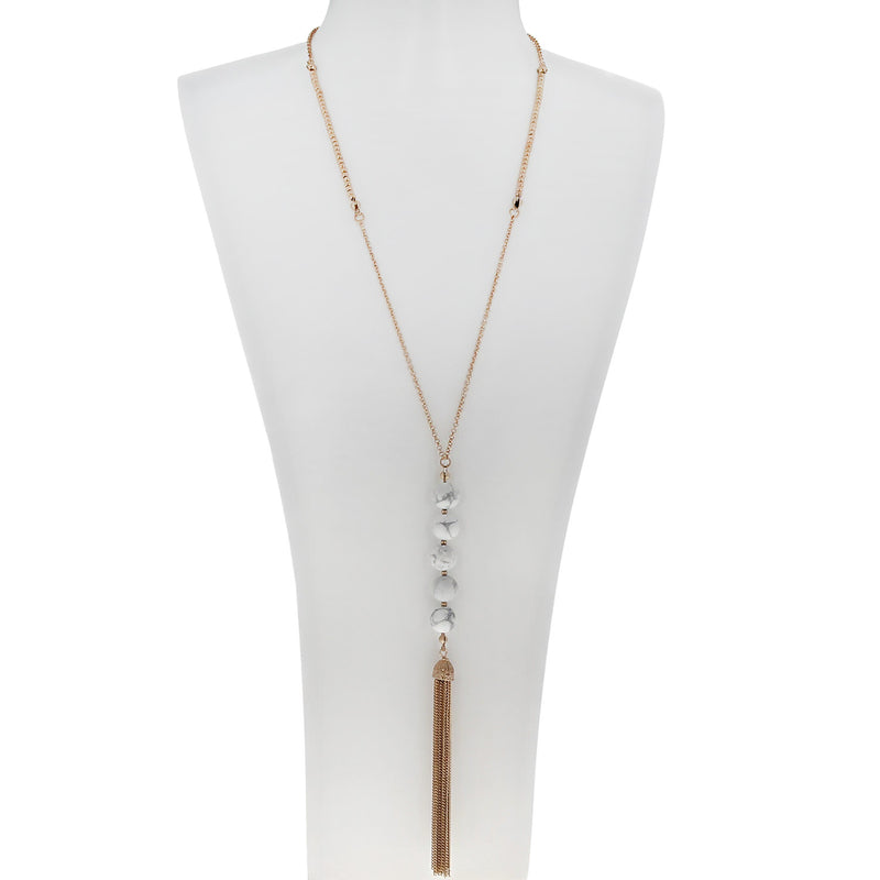 white natural stone drop pendant with gold tassels